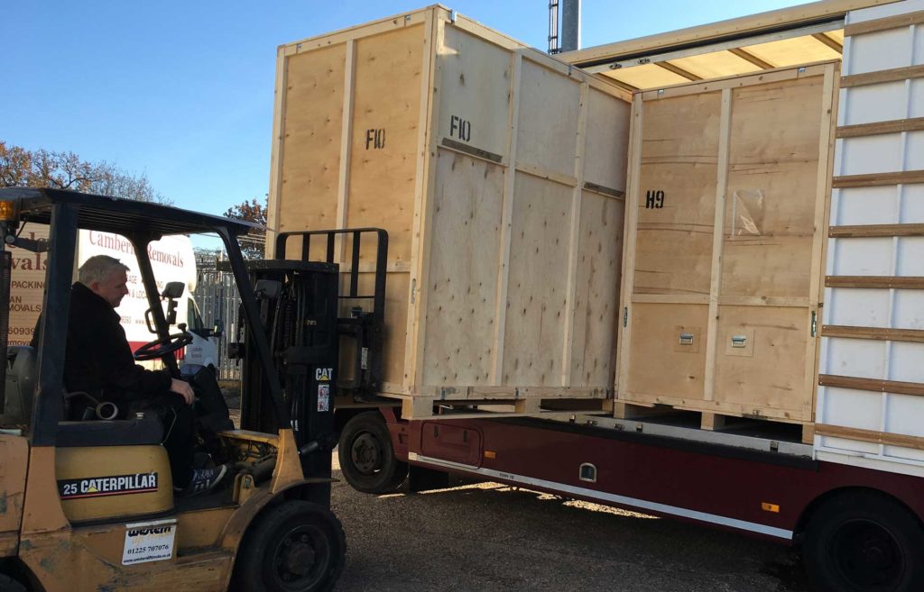 Forklift truck lift storage container from Camberley Removals van