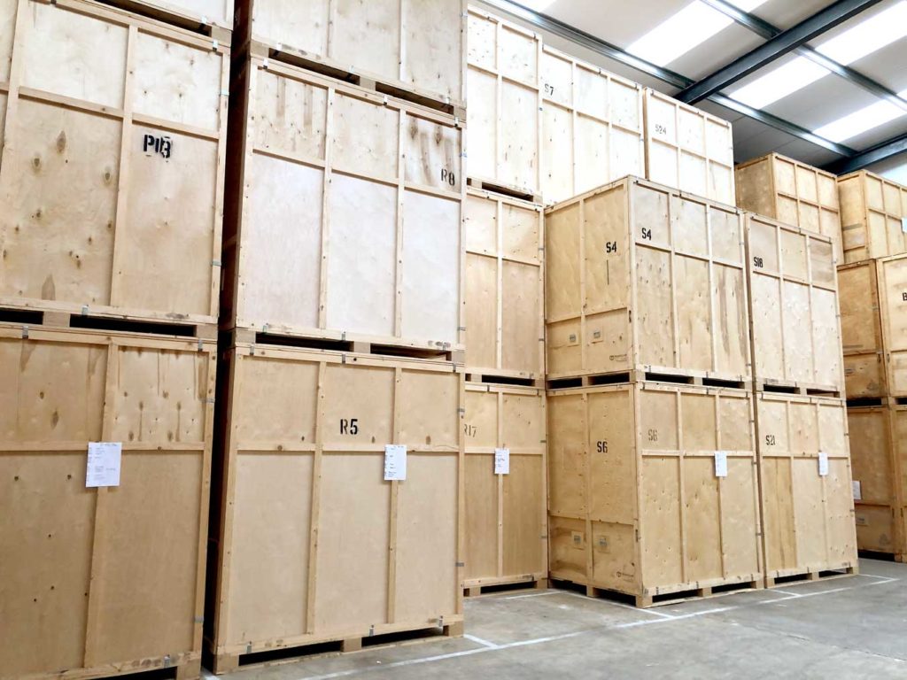 Storage containers in Camberley Removals facility