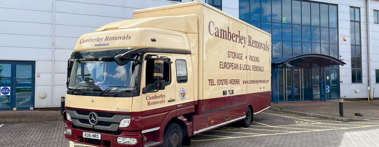 Camberley Removals & Storage vehicle outside office building
