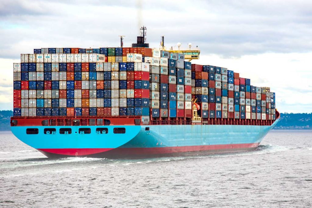 Loaded container ship going to sea